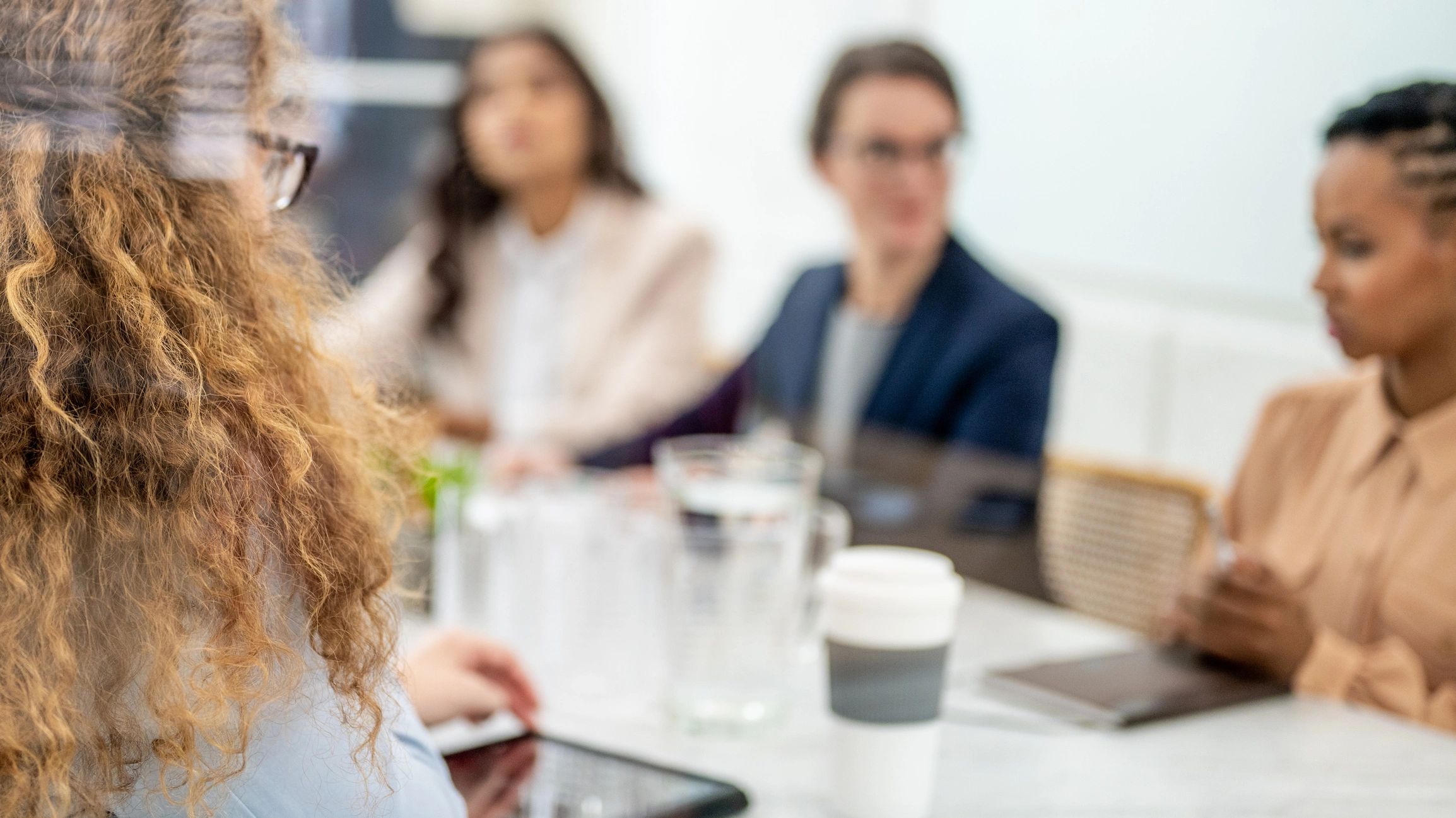Professionals collaborating during a strategy meeting